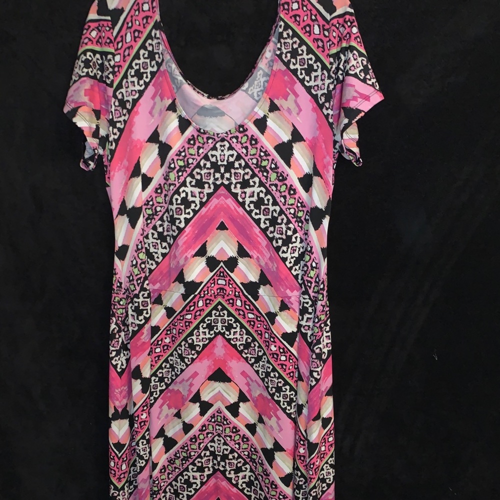 Long, low neck, pink dress.